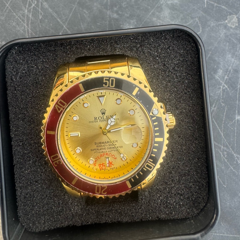 Rolex Submariner Gold And Black Watch